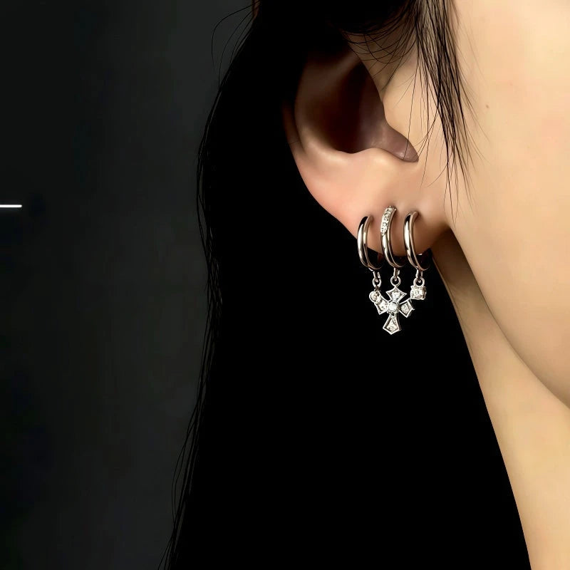 Close-up detail of the sparkling zircons and plating on the Layered Cross Tassel