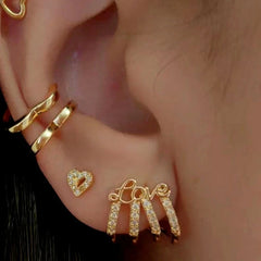 Close-up detail of the sparkling zircons and plating on the LOVE MAMA Studs