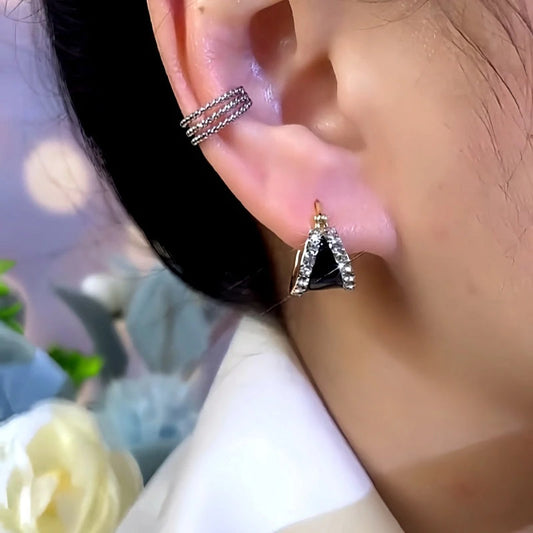 Model showcasing the dangle and style of the 14K Gold-Plated Zircon Oil Drop Earrings