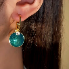 Close-up detail of the sparkling zircons and plating on the Green Enamel Teardrop