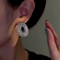 Close-up detail of the sparkling zircons and plating on the Silver Textured Ovals