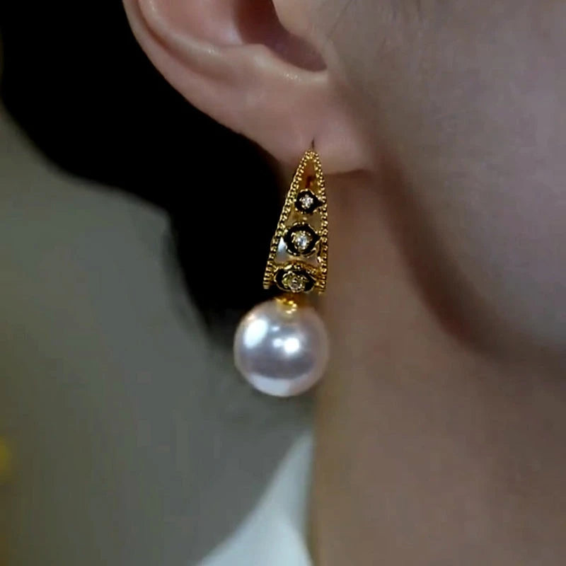 Close-up detail of the sparkling zircons and plating on the Asymmetrical Pearl Drops