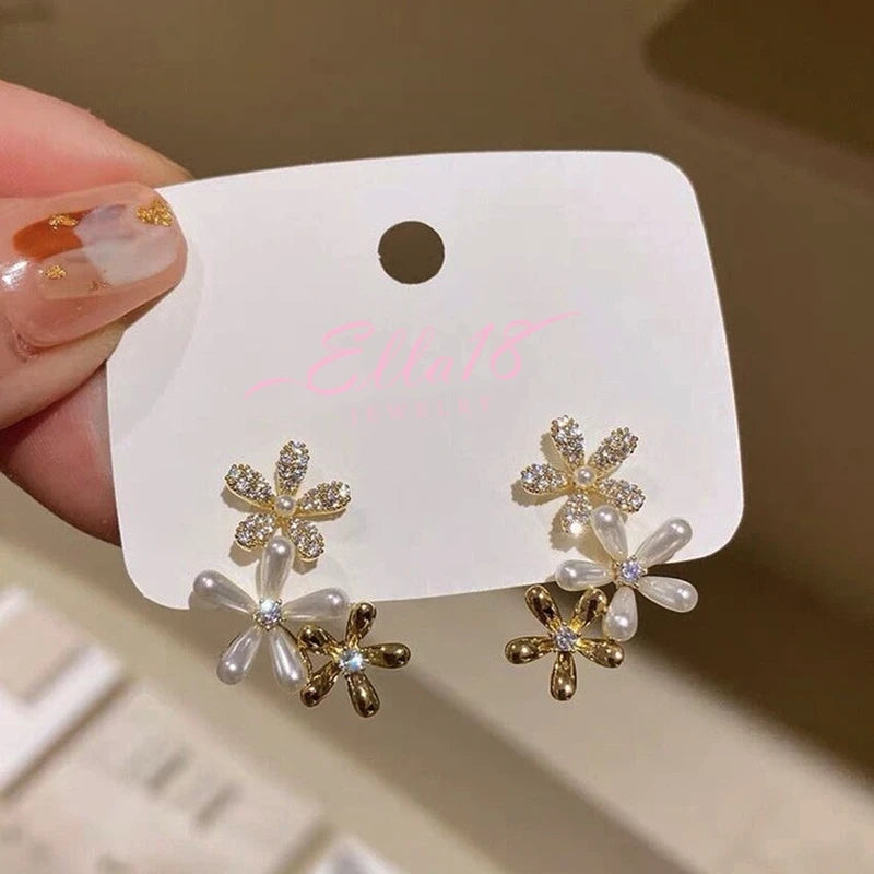 Angled view of the 14K Gold-Plated Zircon Pearl Flower Earrings