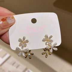 Angled view of the 14K Gold-Plated Zircon Pearl Flower Earrings