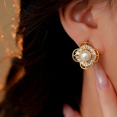Close-up detail of the sparkling zircons and plating on the Flower Stud Earrings