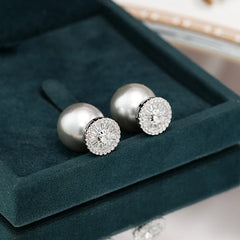 Angled view of the 14K Gold-Plated Zircon Pearl Jacket Earrings