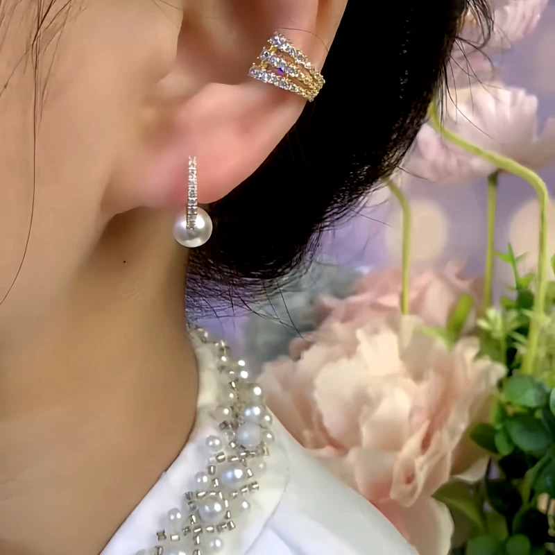 Close-up detail of the sparkling zircons and plating on the Little Hoop Earrings