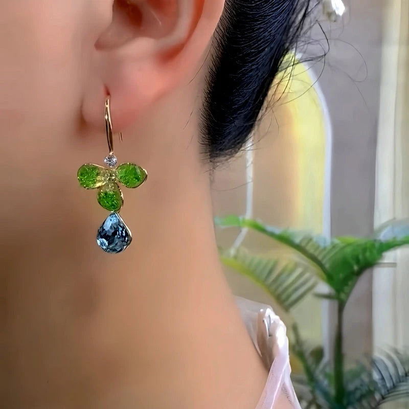 Close-up detail of the sparkling zircons and plating on the Flower Ear Hooks