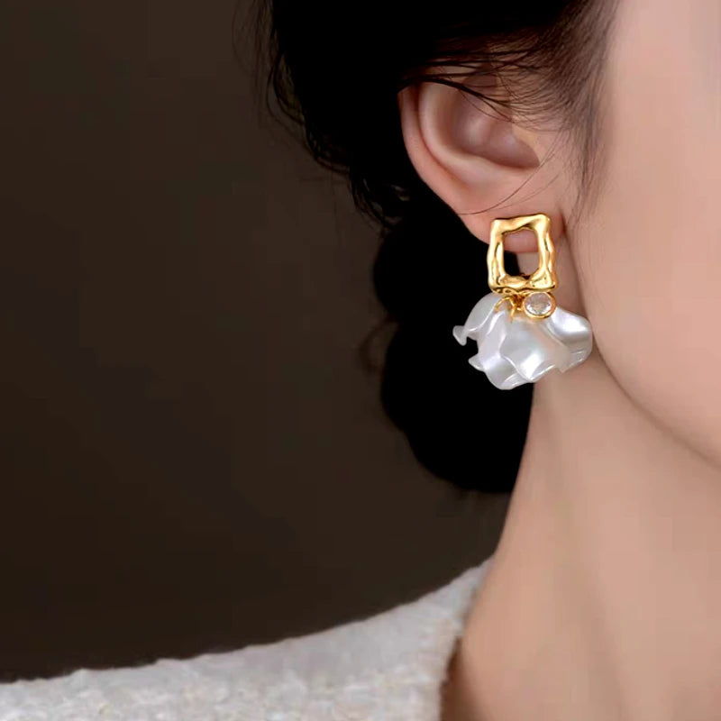 Close-up detail of the sparkling zircons and plating on the Flower Earrings