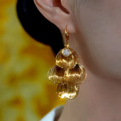 Close-up detail of the sparkling zircons and plating on the Tassel Earrings