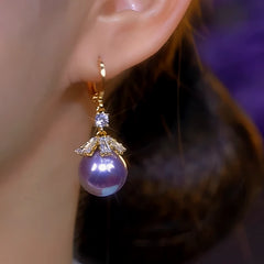 Close-up detail of the sparkling zircons and plating on the Pearl Earrings