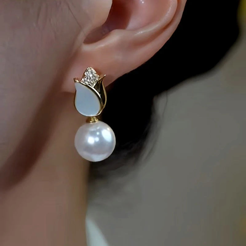 Close-up detail of the sparkling zircons and plating on the Pearl Earrings