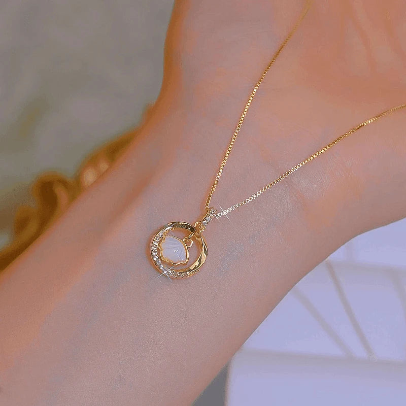 Close-up of the pendant and clasp on the Circle Necklaces