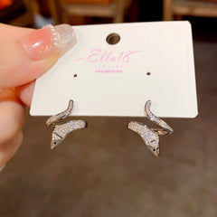 Angled view of the 14K Gold-Plated Zircon Snake-Shaped Earrings