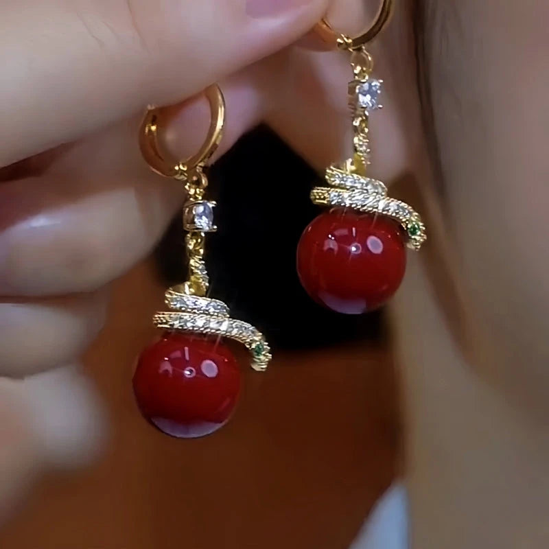 Close-up detail of the sparkling zircons and plating on the Pearl Earrings