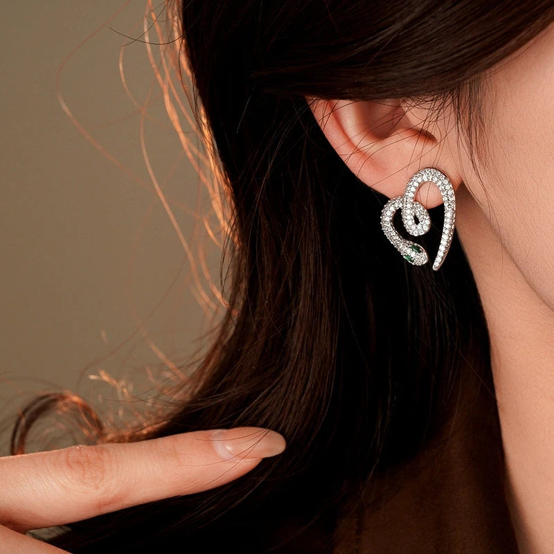 Close-up detail of the sparkling zircons and plating on the Heart Stud Earrings