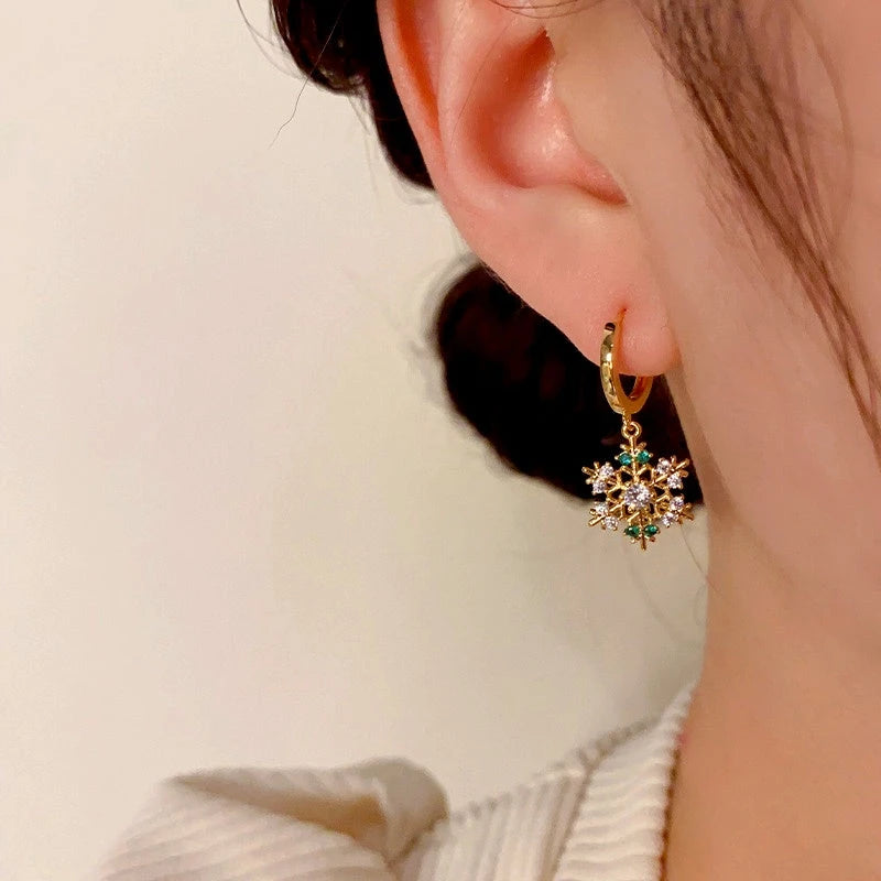 Close-up detail of the sparkling zircons and plating on the Golden Snowflake Earrings