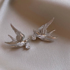 Close-up detail of the sparkling zircons and plating on the Water Drop Earrings
