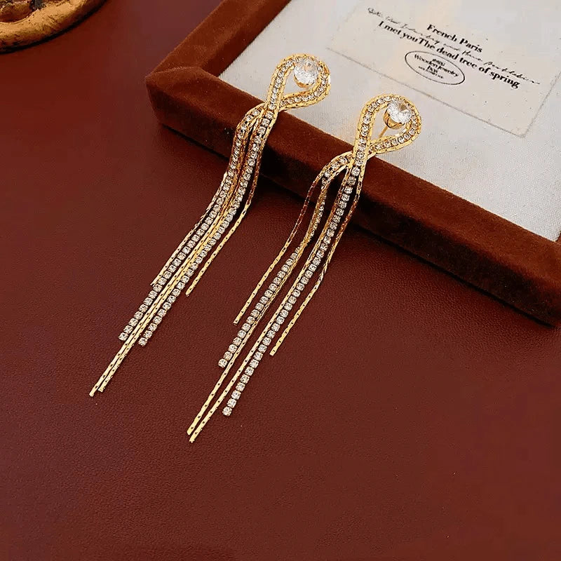 Close-up detail of the sparkling zircons and plating on the Tassel Earrings