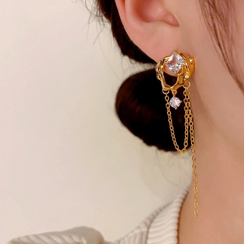 Model showcasing the dangle and style of the 18K Gold-Plated Zircon Tassel Earrings