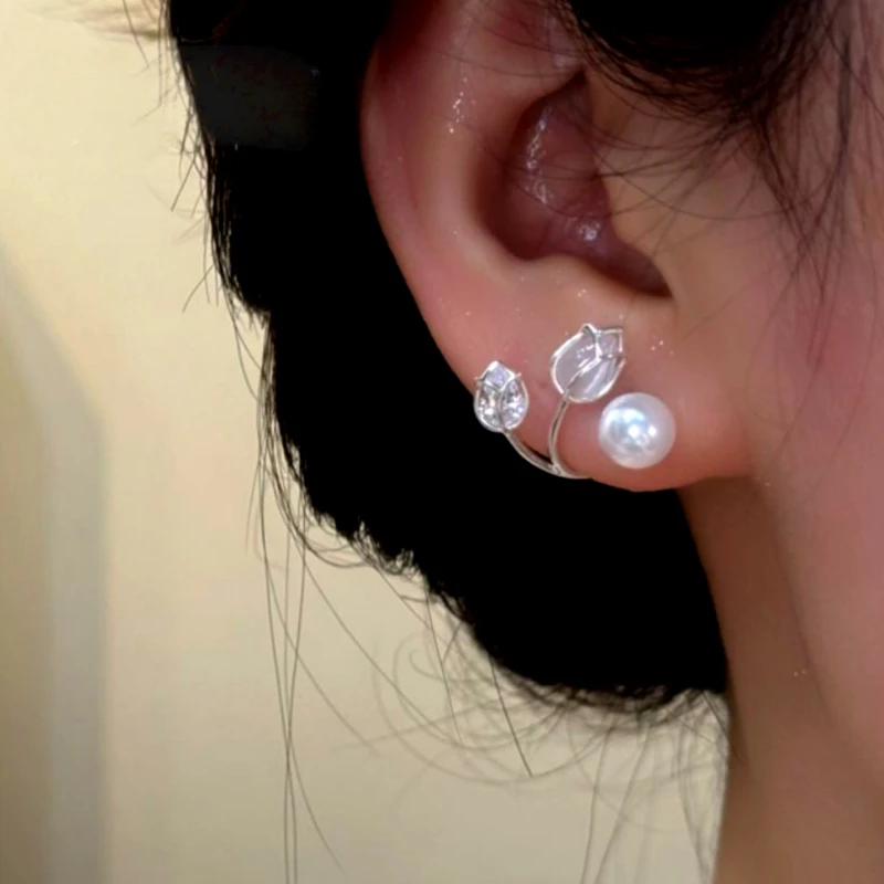 Close-up detail of the sparkling zircons and plating on the Jacket Earrings