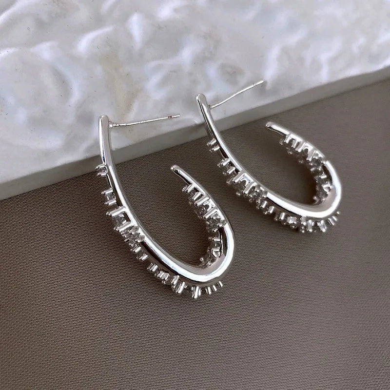 Angled view of the 14K Gold-Plated Zircon Water Drop Ear Hooks