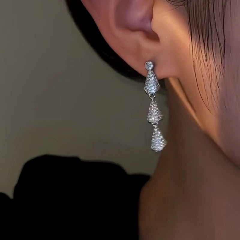 Close-up detail of the sparkling zircons and plating on the Water Drop Earrings