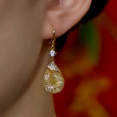 Close-up detail of the sparkling zircons and plating on the Water Drop Earrings