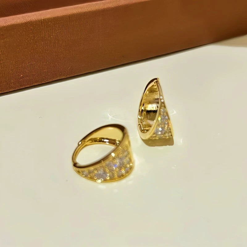 Close-up detail of the sparkling zircons and plating on the Water Drop Earrings