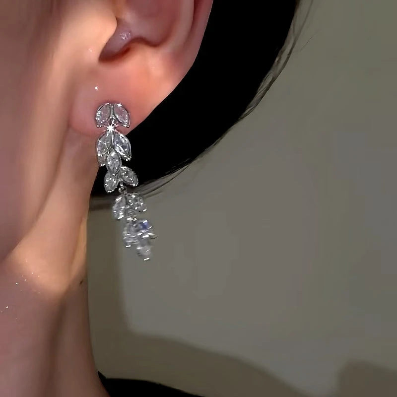 Close-up detail of the sparkling zircons and plating on the Wheat Tassel Earrings