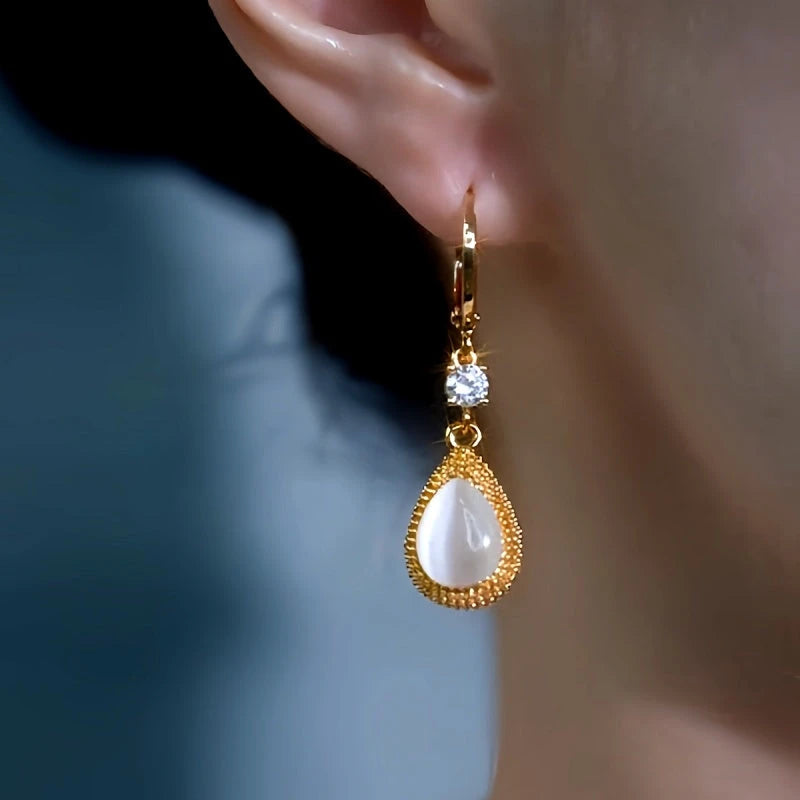 Close-up detail of the sparkling zircons and plating on the Water Drop Earrings