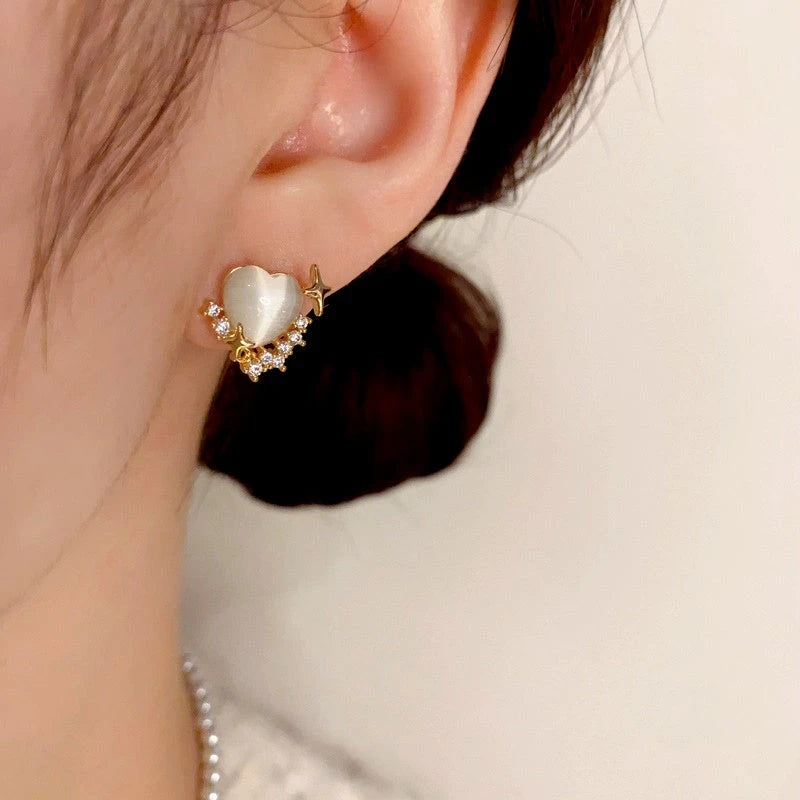 Close-up detail of the sparkling zircons and plating on the Cat's Eye Heart Studs