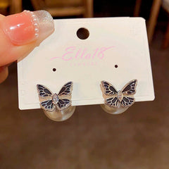 Angled view of the 14K Gold-plated Black Butterfly Pearl Jacket Earrings