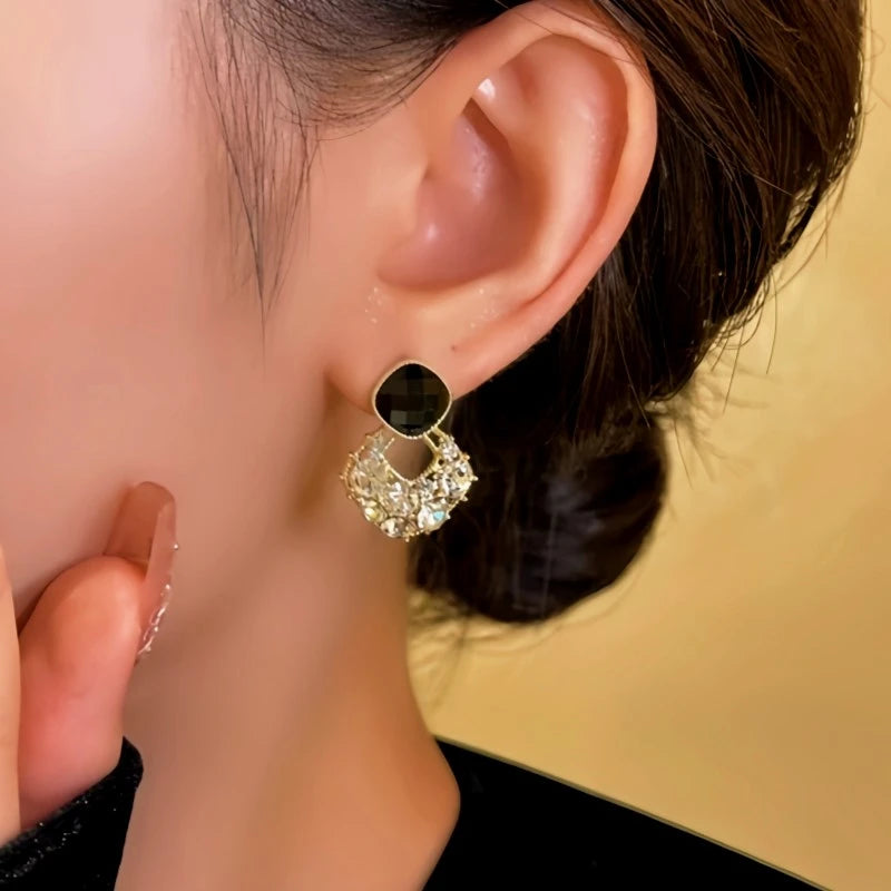 Close-up detail of the sparkling zircons and plating on the Black Zircon Earrings