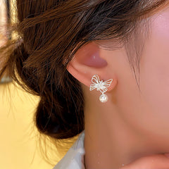 Close-up detail of the sparkling zircons and plating on the Butterfly Bead Earrings