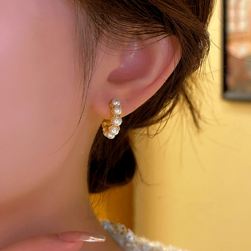 Close-up detail of the sparkling zircons and plating on the C-Shaped Bead Earrings
