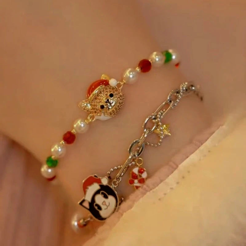 Model wearing the 14K Gold-plated Christmas Cat Colored Beaded Bracelets to highlight its design on the wrist