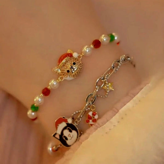Model wearing the 14K Gold-plated Christmas Cat Colored Beaded Bracelets to highlight its design on the wrist