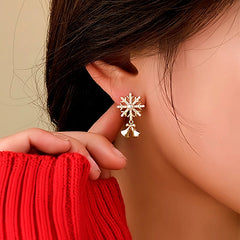 Close-up detail of the sparkling zircons and plating on the Snowflake Bell Earrings