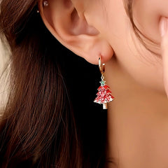 Model showcasing the dangle and style of the 14K Gold-plated Christmas Diamond Zircon Christmas Tree Earrings