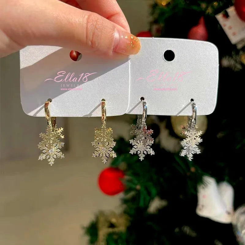 Close-up detail of the sparkling zircons and plating on the Zircon Snowflake Earrings