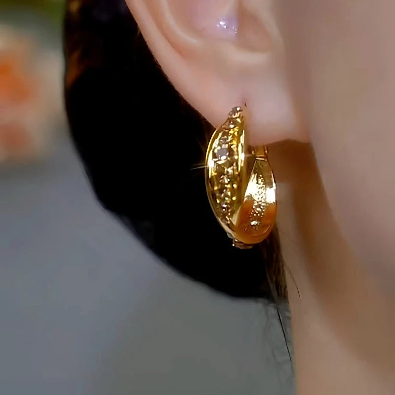 Close-up detail of the sparkling zircons and plating on the Diamond Hoop Earrings