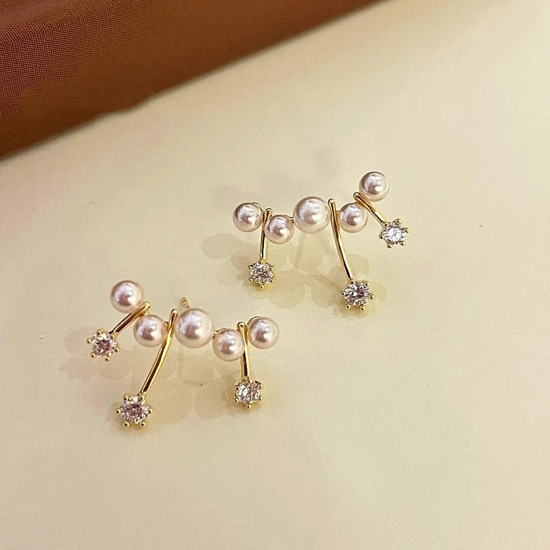 Close-up detail of the sparkling zircons and plating on the Meteor Bead Earrings