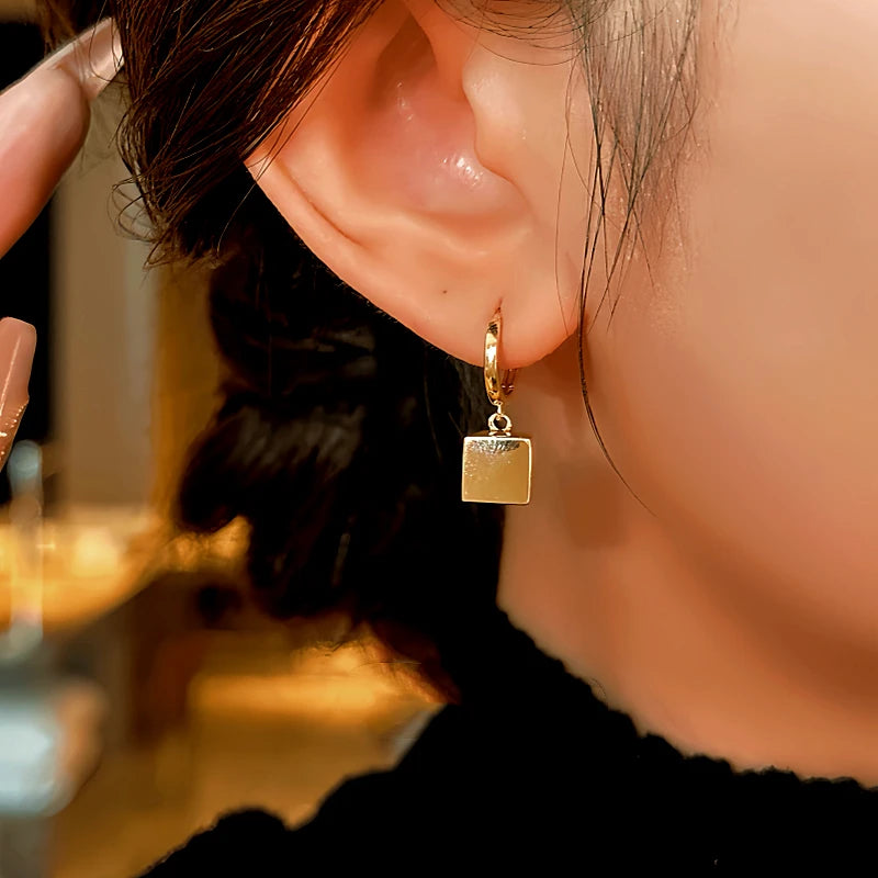 Angled view of the 14K Gold-plated Elegant Square Earrings