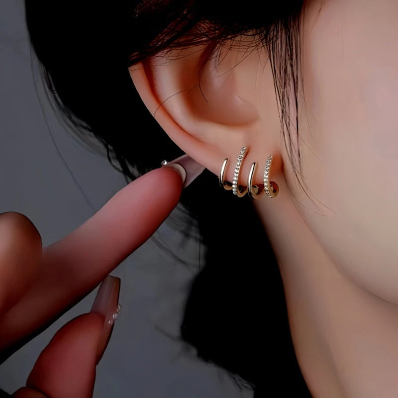 Close-up detail of the sparkling zircons and plating on the Elegant Gold Studs