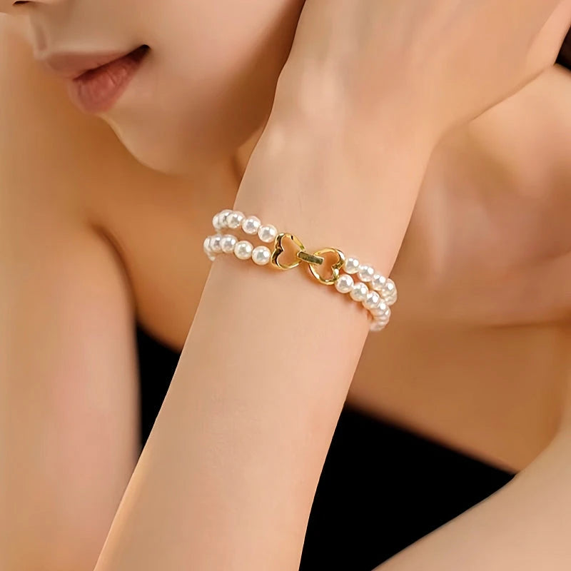 Close-up of the clasp and charm details on the Double Layer Pearl Bracelets