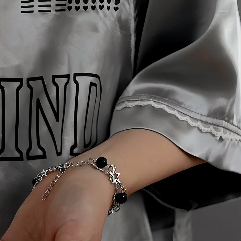 Close-up of the clasp and charm details on the Star Clavicle Bracelet