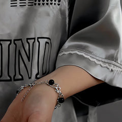 Close-up of the clasp and charm details on the Star Clavicle Bracelet