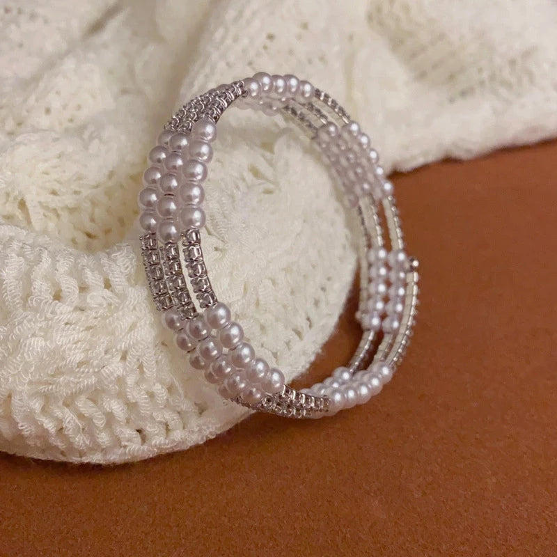 Full view of the elegant 14K Gold-plated Exquisite Pearl Elastic Stacking Bracelets