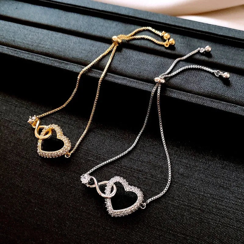 Close-up of the clasp and charm details on the Adjustable Heart Bracelet